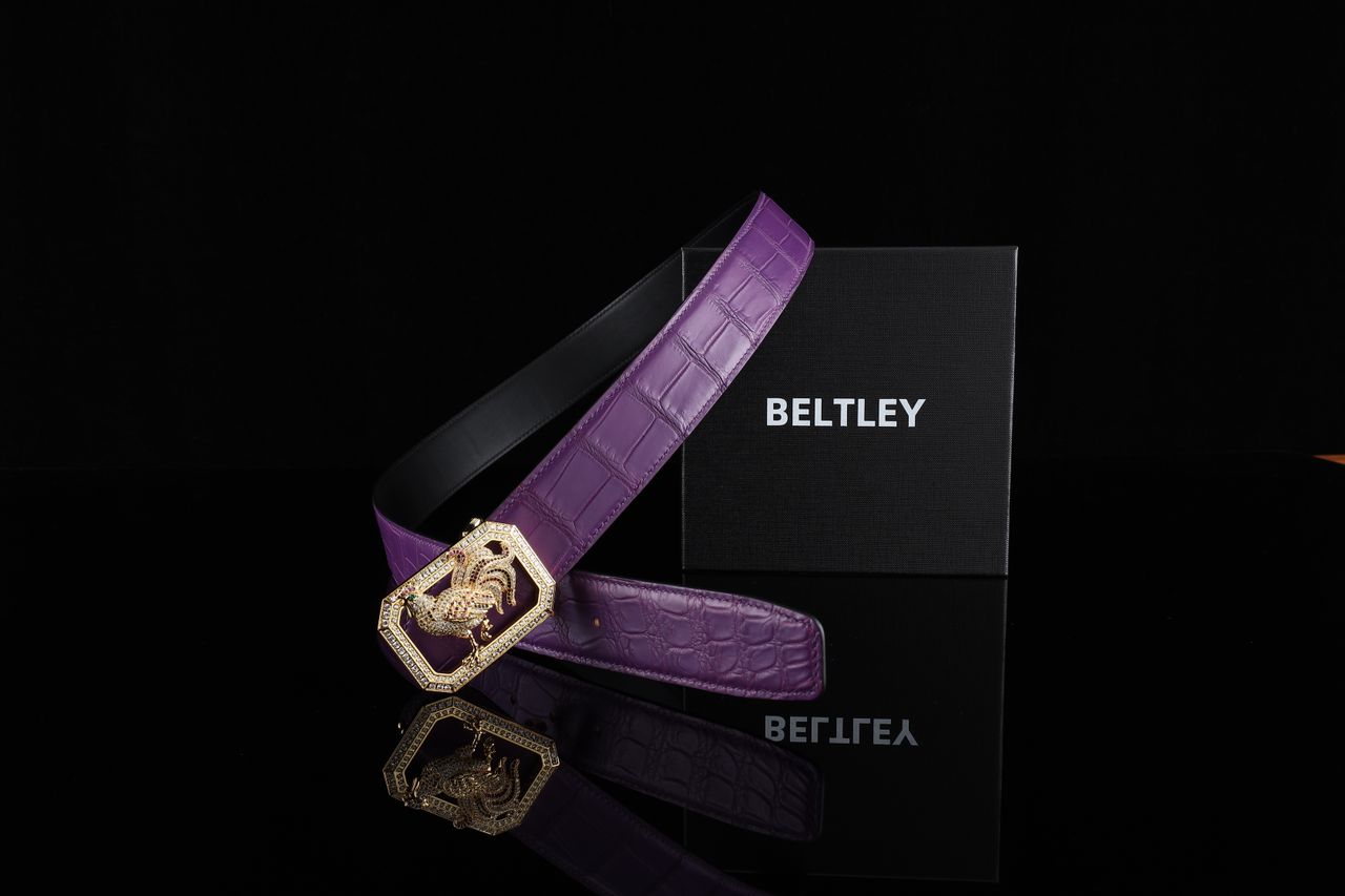 Elegant purple leather belt featuring a dragon buckle, perfect for upscale fashion statements.