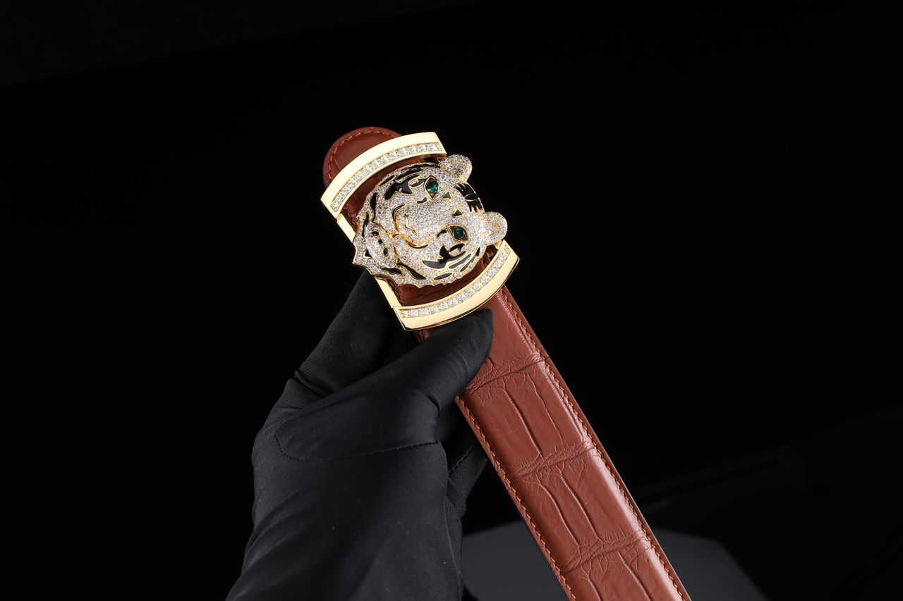 Luxury brown leather belt with diamond tiger buckle, perfect for fashion and style enthusiasts.